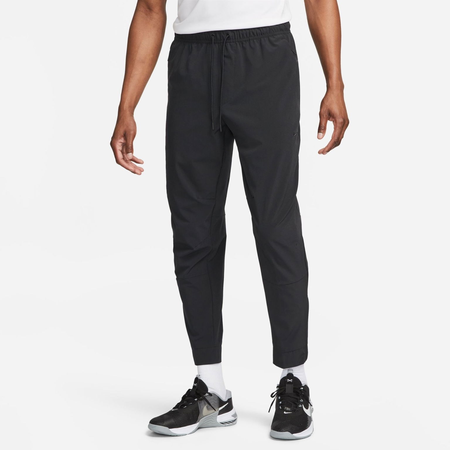 Pánske tepláky Nike Unlimited Mens Dri-FIT Zippered Cuff Versatile Pants